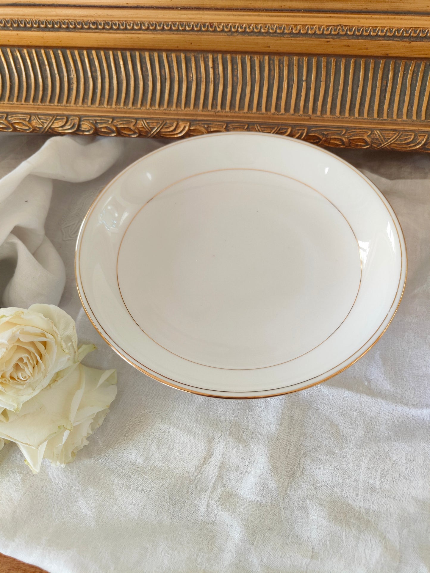 Assiette à piédouche / compotier en porcelaine de Limoges