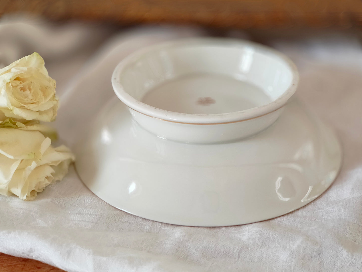 Assiette à piédouche / compotier en porcelaine de Limoges